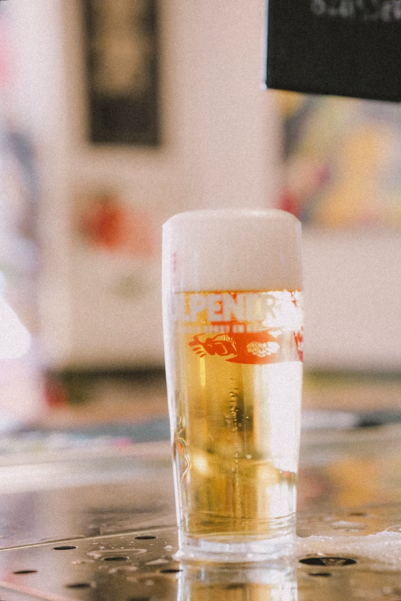 Barkeeper pouring a beer at the bar
